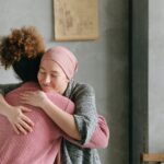 women hugging each other