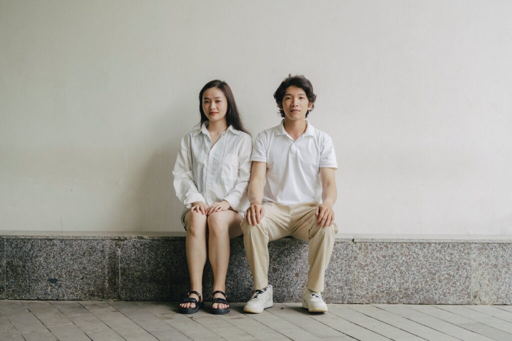 photo of a young couple sitting together
