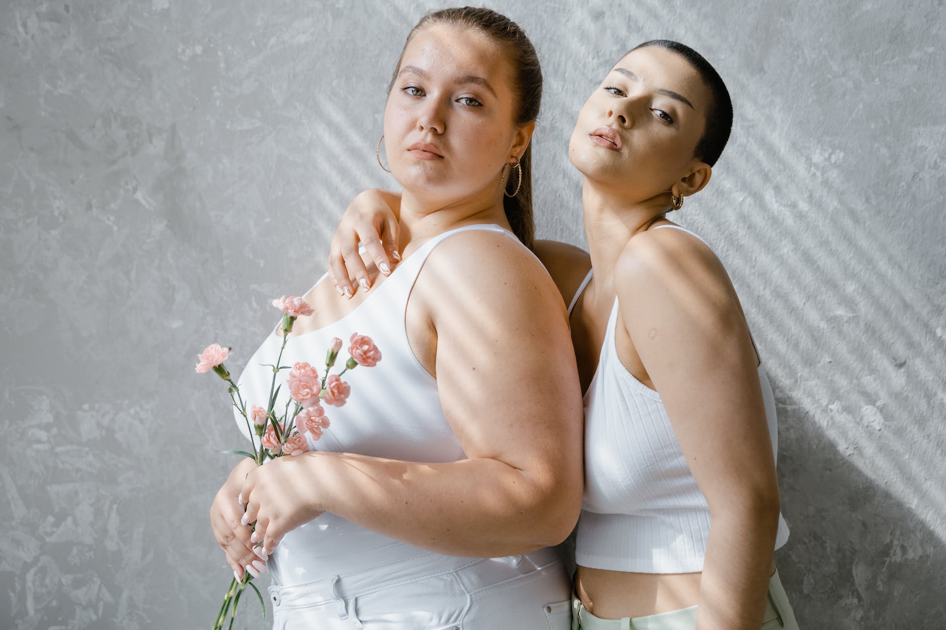 women in white tank top